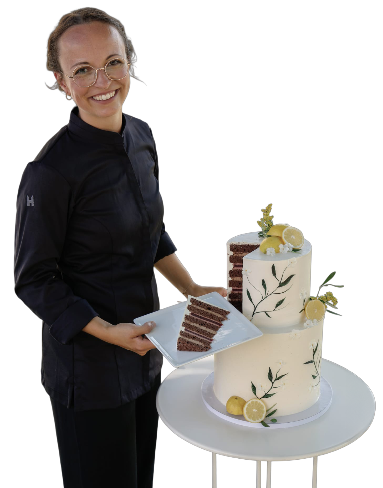 Verena Mokroß Inhaberin schneidet eine Torte an